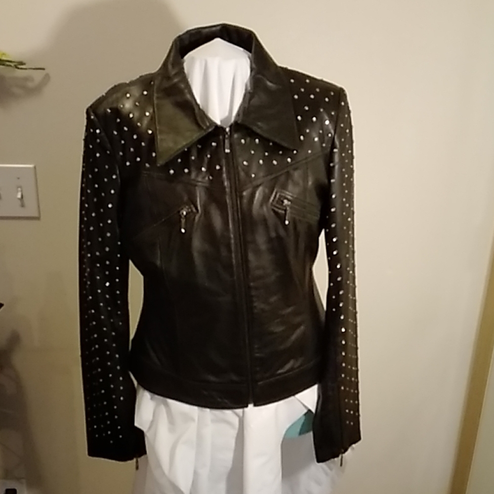 Excellent used black leather jacket & pants